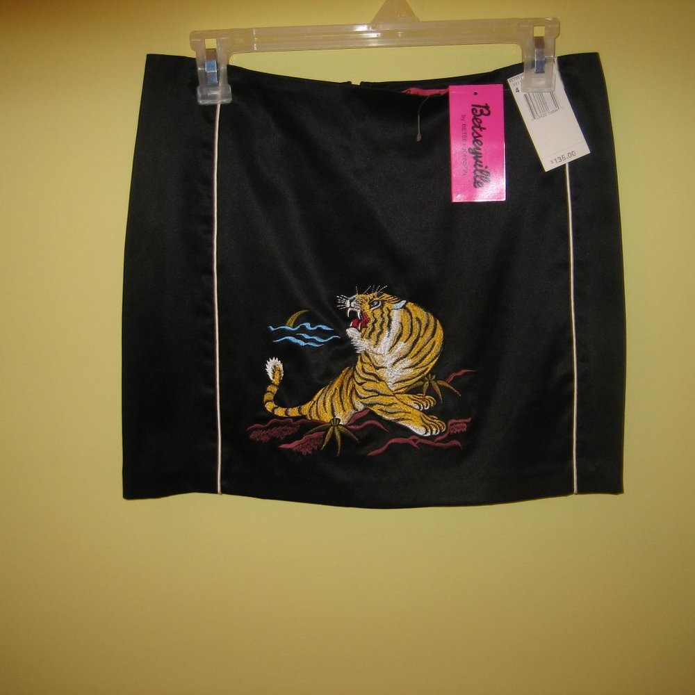 black silk miniskirt , embroidered front